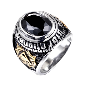 Vintage men's stainless steel signet ring with large black gemstone and embossed details