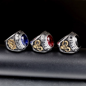 Vintage stainless steel signet rings with large blue, red, and black gemstones for men