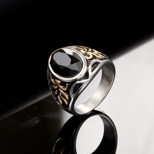 Vintage men's stainless steel ring with black gemstone and golden floral relief
