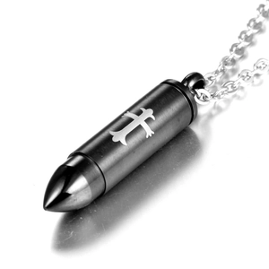 Brushed black steel bullet pendant necklace with silver cross on white background