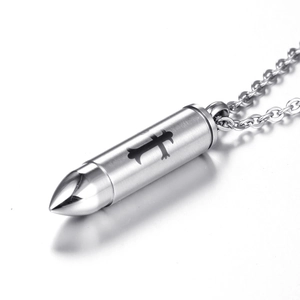 Detail of silver bullet pendant with black gothic cross and sturdy metal chain