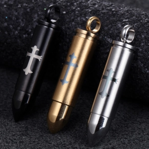 Three stainless steel bullet pendants with cross engraving in black, gold and silver