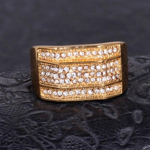 Gold plated stainless steel wide ring featuring triple row of sparkling cubic zirconia