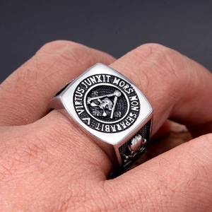Vintage stainless steel Freemason ring featuring skull relief and Latin engraving