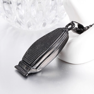 Collier avec pendentif rasoir en acier inoxydable noir pour homme avec design de tondeuse