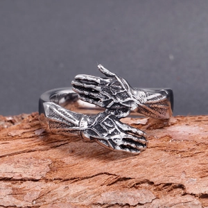 Fashionable men's stainless steel hugging hands ring with vintage silver finish and texture