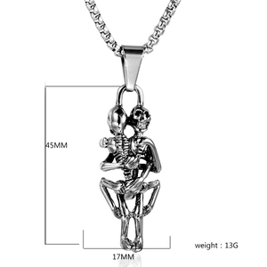 Detail view of gothic skull pendant necklace with 45mm height and polished steel finish