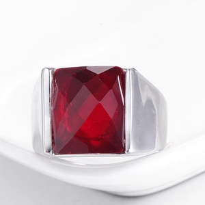 Vintage stainless steel ring for men with a large rectangular red gemstone on white
