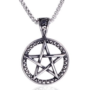 Detailed close-up of retro stainless steel star pendant with textured ring and box chain