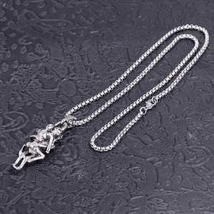 Artistic silver stainless steel skull pendant necklace with box chain on black leather
