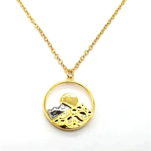Golden round mountain landscape pendant necklace for men and women with sunset relief