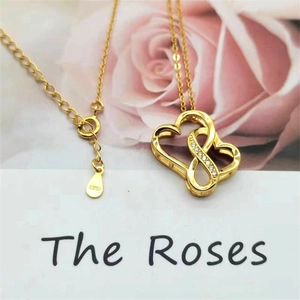 Elegant gold S925 sterling silver necklace with interlocking double heart diamond pendant