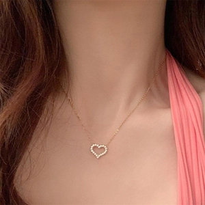 Elegant S925 sterling silver hollow heart necklace with micro-pave crystals for women