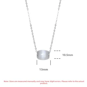 Macro detail of S925 silver necklace with 13mm pearlescent cat eye stone barrel pendant