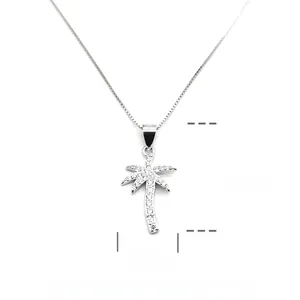 Detailed view of S925 sterling silver coconut tree pendant with white zircon stones