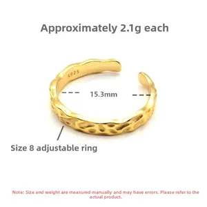 Detailed view of hammered gold S925 sterling silver open ring showing S925 engraving