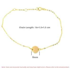 Detail of gold chain bracelet showing 16cm length with two 1.5cm extensions and 8mm round pendant