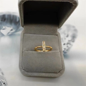Macro view of gold S925 sterling silver ring with three vertical baguette zircons