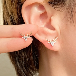 S925 silver gold-plated reindeer stud earrings with cubic zirconia on female model