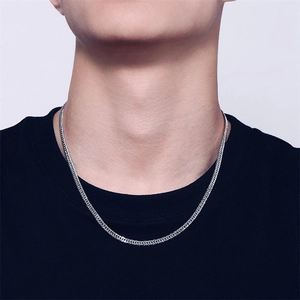 Men's S925 sterling silver curb chain necklace shown on model with polished finish