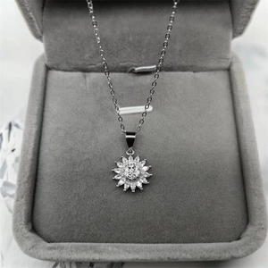 Elegant S925 sterling silver sunflower pendant with sparkling crystals in a gift box