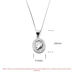 Macro shot of S925 silver planet pendant showing 11mm width and 20mm height dimensions