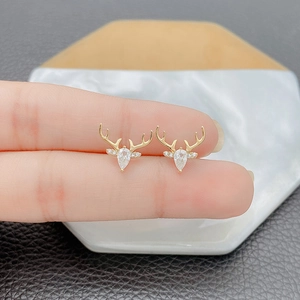 Detailed close-up of S925 sterling silver reindeer stud earrings with crystal zirconia