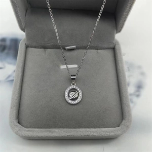 Elegant S925 silver planet pendant necklace with sparkling rhinestones on jewelry display