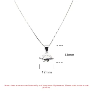 Vue détaillée montrant les dimensions 13mm x 12mm du pendentif dinosaure en argent