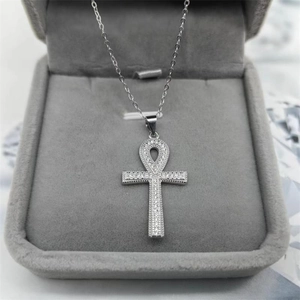 S925 silver Ankh cross pendant with sparkling stones presented in a grey jewelry box