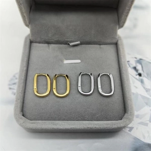 Minimalist S925 sterling silver oval hoop earrings in polished gold and silver finishes