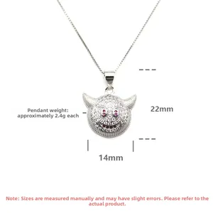 Detailed macro view of S925 silver demon pendant with zircon stones and purple eyes