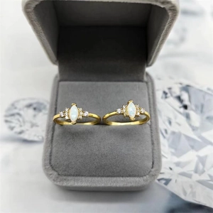 S925 silver gold plated ring with marquise white opal and side accent diamonds