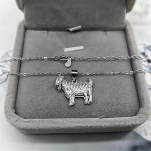 Macro detail of S925 sterling silver goat pendant with shimmering pavé cubic zirconia