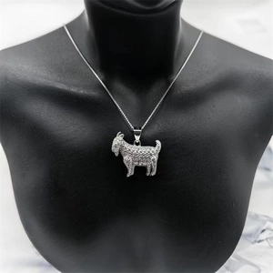 Detailed macro view of S925 silver goat pendant with shimmering pavé diamond setting