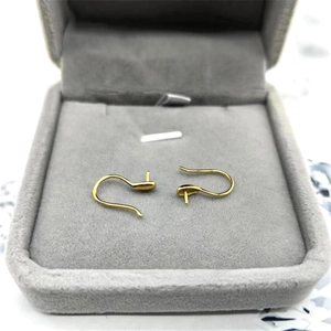 Macro detail of gold S925 silver earring hooks for DIY pearl jewelry settings