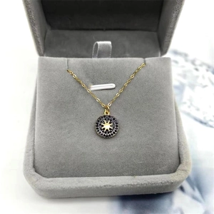 S925 silver north star coin pendant necklace with black crystals in jewelry box