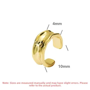 Detailed view of irregular hammered texture gold ear cuff with 10mm diameter and 4mm width