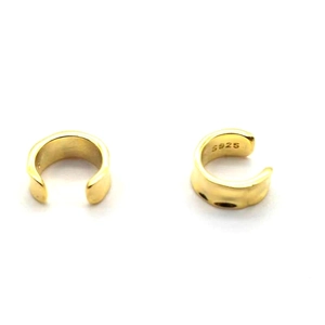 Detailed close-up of textured gold-plated S925 silver ear cuffs with hammered finish surface