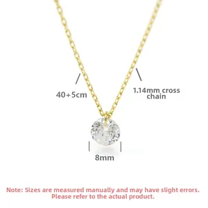 Detail of 8mm cubic zirconia pendant with 40+5cm golden cable chain necklace