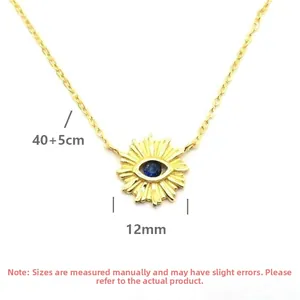 Macro shot of 12mm S925 sterling silver evil eye pendant with golden sunray texture