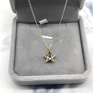 S925 silver gold-plated star necklace with blue gemstone pendant on jewelry box
