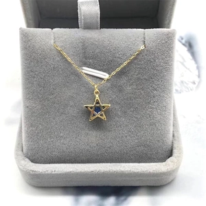 S925 silver gold-plated star necklace with blue crystal on a velvet jewelry box