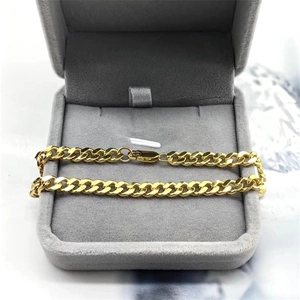 Bracelet maille gourmette en argent S925 plaqué or présenté dans son écrin à bijoux luxe