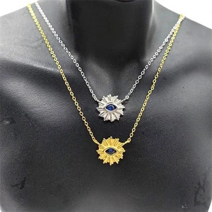 Detail of S925 silver Evil Eye sunburst pendant necklaces in gold and silver finish