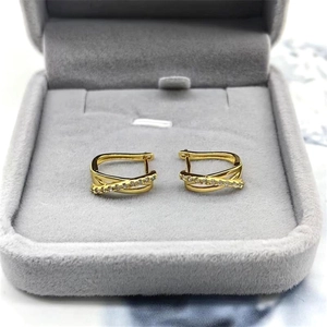 Créoles croisées en argent sterling S925 avec diamants pavés et finition dorée