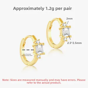 Detailed view of S925 silver gold-plated hoop earrings with cubic zirconia stones