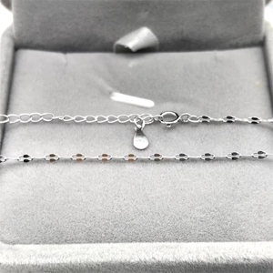 Elegant S925 sterling silver lip chain necklace displayed on grey velvet jewelry box