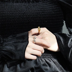 Chic S925 sterling silver asymmetrical rings in gold and silver finish worn by a model
