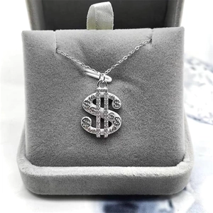 S925 sterling silver dollar sign pendant necklace with cubic zirconia on velvet box